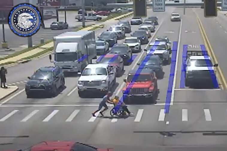 ‘spider-man’-superhero,-20,-saves-the-day-helping-man-in-wheelchair-pass-six-lanes-of-traffic