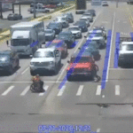 good-samaritan-in-spider-man-costume-helps-man-in-wheelchair-cross-busy-intersection-in-viral-moment