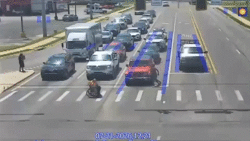 good-samaritan-in-spider-man-costume-helps-man-in-wheelchair-cross-busy-intersection-in-viral-moment