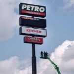illinois-worker-spent-over-six-hours-trapped-in-gas-station-sign-too-tall-for-fire-truck-ladders-to-reach