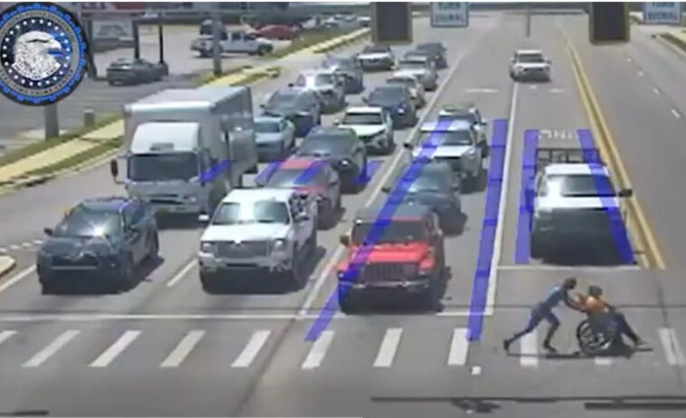 watch:-wheelchair-bound-man-rescued-by-superhero-as-he-struggles-to-cross-intersection 