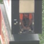 see-it:-man-trapped-130-feet-in-the-air-in-gas-station-sign
