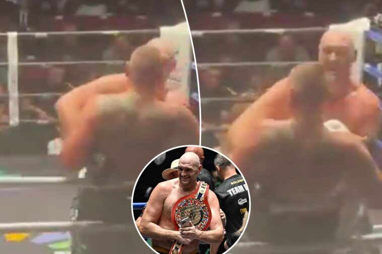 tyson-fury-seemingly-kisses-opponent-mid-match-in-wild-scene