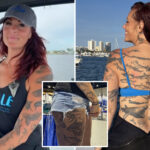 biologist-turns-body-into-work-of-art-with-record-breaking-number-of-shark-tattoos