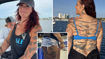 biologist-turns-body-into-work-of-art-with-record-breaking-number-of-shark-tattoos