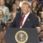 watch:-“he’s-a-communist!-you-see-what-they-want-to-do?”-–-trump-trolls-protester-removed-from-his-rally-in-michigan,-crowd-chants-“usa”