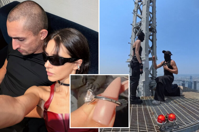 daredevils-arrested-after-scaling-empire-state-building-in-wild-nyc-engagement-stunt-finally-get-ring-back