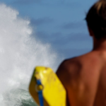 watch:-16-year-old-lifeguard-becomes-hero-for-saving-child-from-massive-waves-at-california-beach