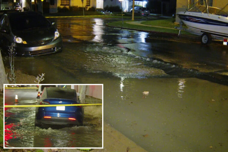 torrent-of-water-floods-the-streets-of-los-angeles-again-—-as-another-sinkhole-opens-up