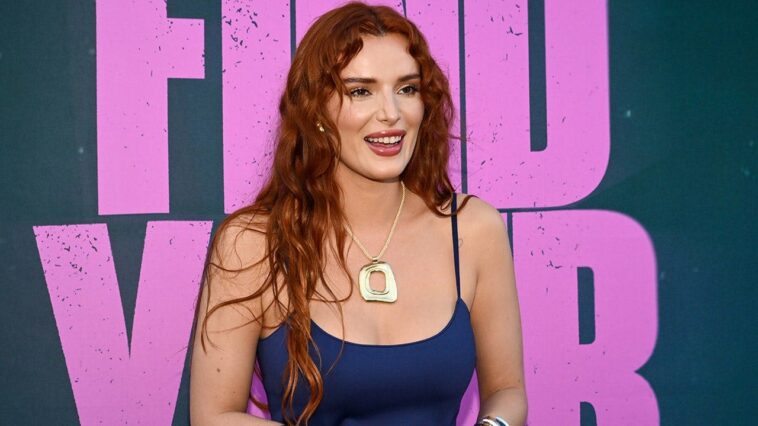 former-disney-star-bella-thorne-stuns-in-green-sequin-bikini-during-beach-day-with-fiance
