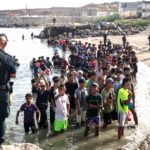 death-toll-hits-triple-digits,-thousands-of-africans-remain-in-spanish-city-in-aftermath-of-invasion