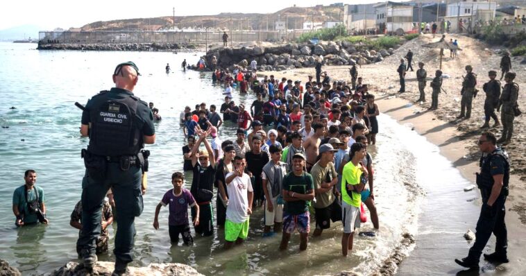 death-toll-hits-triple-digits,-thousands-of-africans-remain-in-spanish-city-in-aftermath-of-invasion