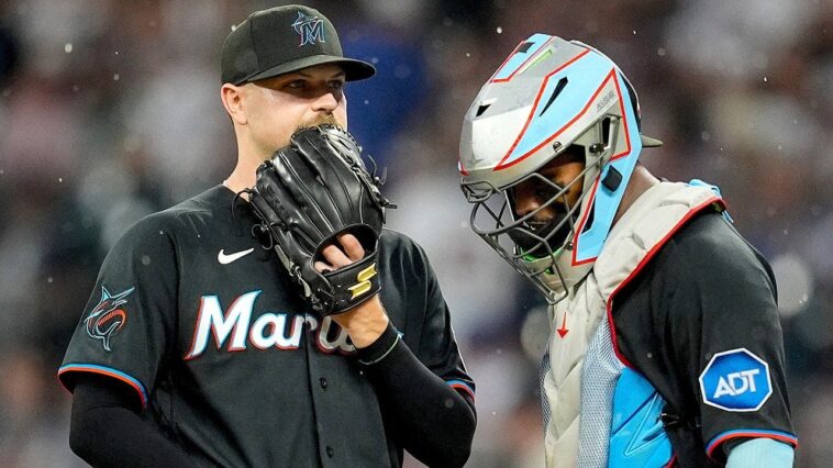 marlins-outfielders-collide,-knock-fly-ball-over-wall-to-give-braves-star-a-home-run-in-brutal-mishap