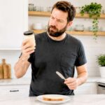 man-unsure-whether-wife’s-vanilla-honey-goat-butter-spread-is-for-toast-or-face