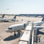 passengers-evacuate-down-slide-at-atl-airport-shortly-after-smoke-forces-emergency-landing