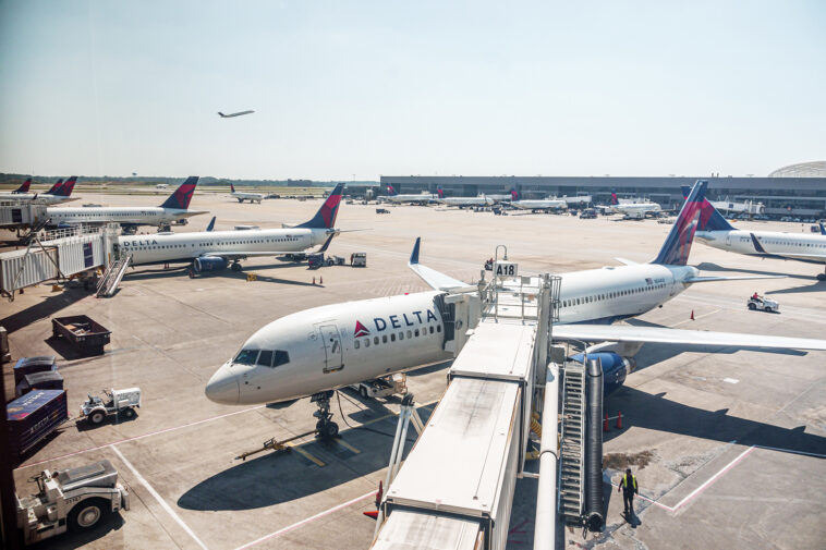 passengers-evacuate-down-slide-at-atl-airport-shortly-after-smoke-forces-emergency-landing
