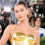 hailey-bieber-shows-off-toned-figure-in-tiny-yellow-bikini-while-sharing-summer-snaps