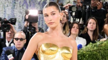 hailey-bieber-shows-off-toned-figure-in-tiny-yellow-bikini-while-sharing-summer-snaps