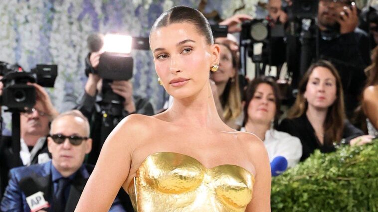 hailey-bieber-shows-off-toned-figure-in-tiny-yellow-bikini-while-sharing-summer-snaps