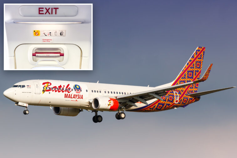 plane-passengers-restrain-lunatic-who-threatened-crew-and-‘felt-like’-opening-emergency-exit-midflight