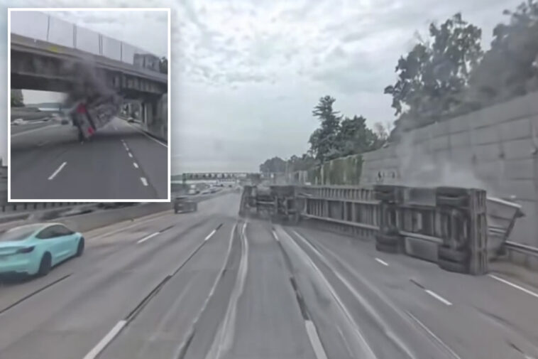 terrifying-footage-shows-huge-tractor-trailer-slam-into-new-york-overpass,-tip-over-on-busy-highway