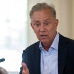 trump-looms-over-blue-state-primary-as-progressive-gov-faces-far-left-challenge