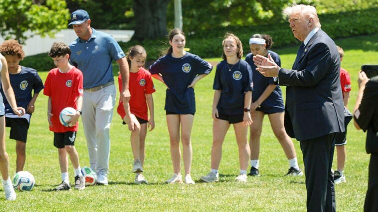 pat-mcafee-attends-sporting-event-with-president-trump-wearing-jeans-and-a-backwards-cap
