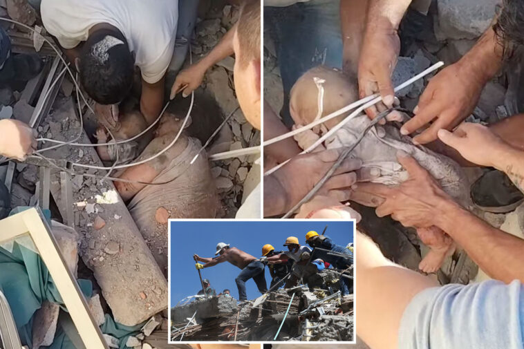 astonishing-video-shows-baby-rescued-from-rubble-as-colombian-quake-toll-tops-250