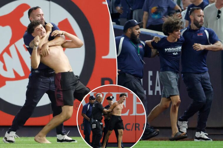 three-fans-get-tackled-by-security-after-storming-field-at-yankees-game-in-wild-scene