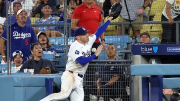 dodgers-star-freddie-freeman-takes-scary-tumble-down-dugout-steps-trying-to-catch-pop-fly