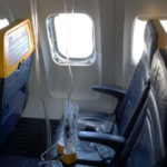 passenger-saved-from-getting-sucked-out-of-plane-after-midair-disaster