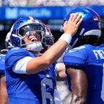 jaxson-dart-goes-to-medical-tent-after-brutal-hit-—-returns-to-throw-beautiful-giants-touchdown