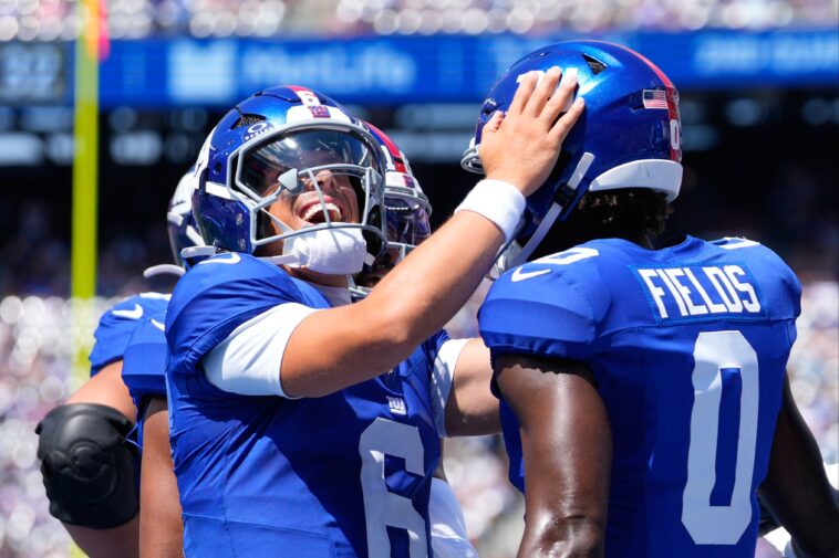 jaxson-dart-goes-to-medical-tent-after-brutal-hit-—-returns-to-throw-beautiful-giants-touchdown