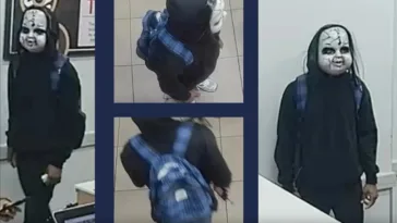 black-man-in-chucky-style-mask-chased,-threatened-woman-with-death