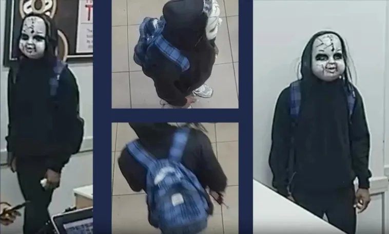 black-man-in-chucky-style-mask-chased,-threatened-woman-with-death