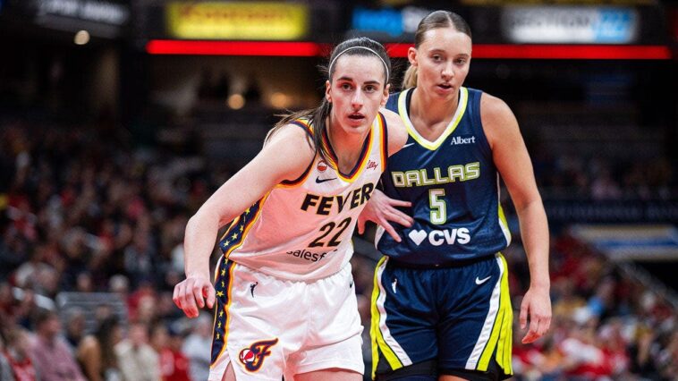 paige-bueckers-grabs-caitlin-clark’s-arm,-draws-foul-in-tense-moment-before-halftime-of-wings-win-over-fever