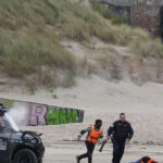 watch:-police-intercepting-smuggler-boat-bound-for-britain-attacked-by-migrants