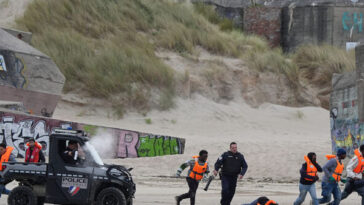 watch:-police-intercepting-smuggler-boat-bound-for-britain-attacked-by-migrants