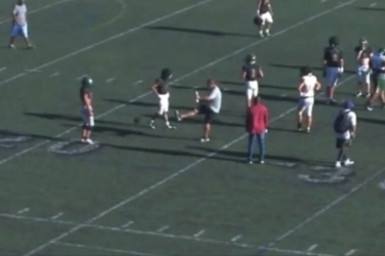 moment-raging-high-school-football-coach-blasts-ball-into-youngster’s-crotch