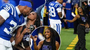 simone-biles-kisses-husband-jonathan-owens-on-the-field-before-colts-game