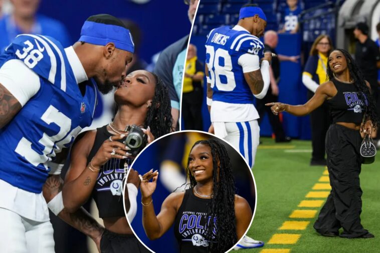 simone-biles-kisses-husband-jonathan-owens-on-the-field-before-colts-game