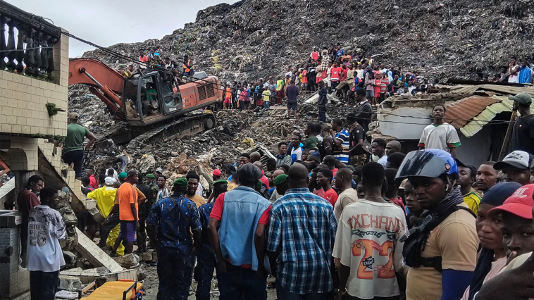 massive-garbage-heap-collapses-onto-homes,-killing-at-least-30-as-rescuers-search-for-survivors