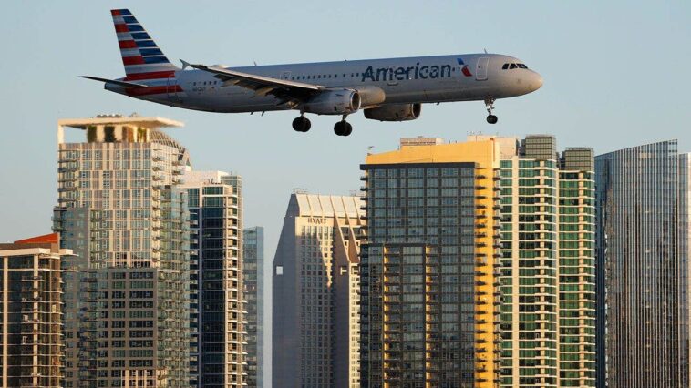 american-airlines-flight-lands-safely-after-laptop-battery-catches-fire-on-board;-passenger-injured