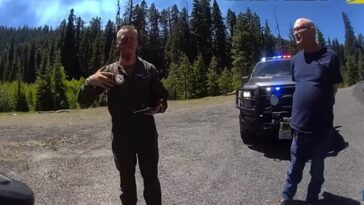 incredible-footage:-police-roll-up-on-blood-streaked-man-in-middle-of-road,-learn-his-f/a-18-just-cratered-into-mountainside,-but-he’s-ok