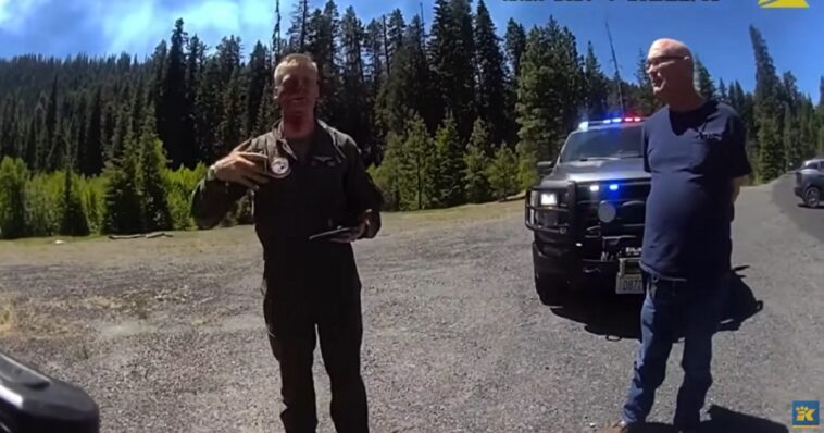 incredible-footage:-police-roll-up-on-blood-streaked-man-in-middle-of-road,-learn-his-f/a-18-just-cratered-into-mountainside,-but-he’s-ok