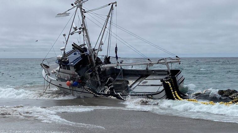 massive-fishing-boat-runs-aground-at-popular-beach-with-1,000-gallons-of-diesel-on-board