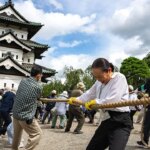 hundreds-of-volunteers-pull-360-tonne-historic-japanese-castle-back-into-place-by-hand