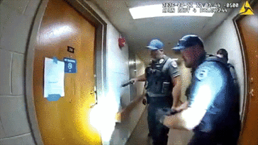 watch:-man-accused-of-aiming-flamethrower-at-officers-serving-eviction-notice-in-wild-bodycam-video