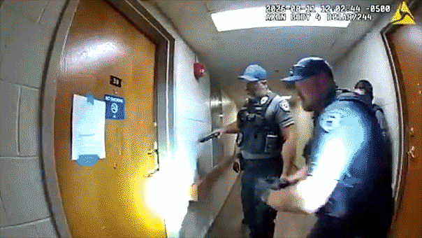 watch:-man-accused-of-aiming-flamethrower-at-officers-serving-eviction-notice-in-wild-bodycam-video