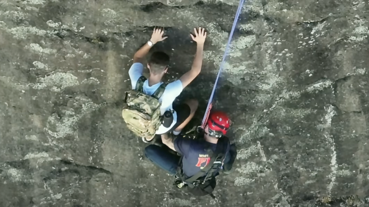 free-climber-stranded-on-georgia-rock-face-calls-911,-prompting-dramatic-rescue-by-firefighter
